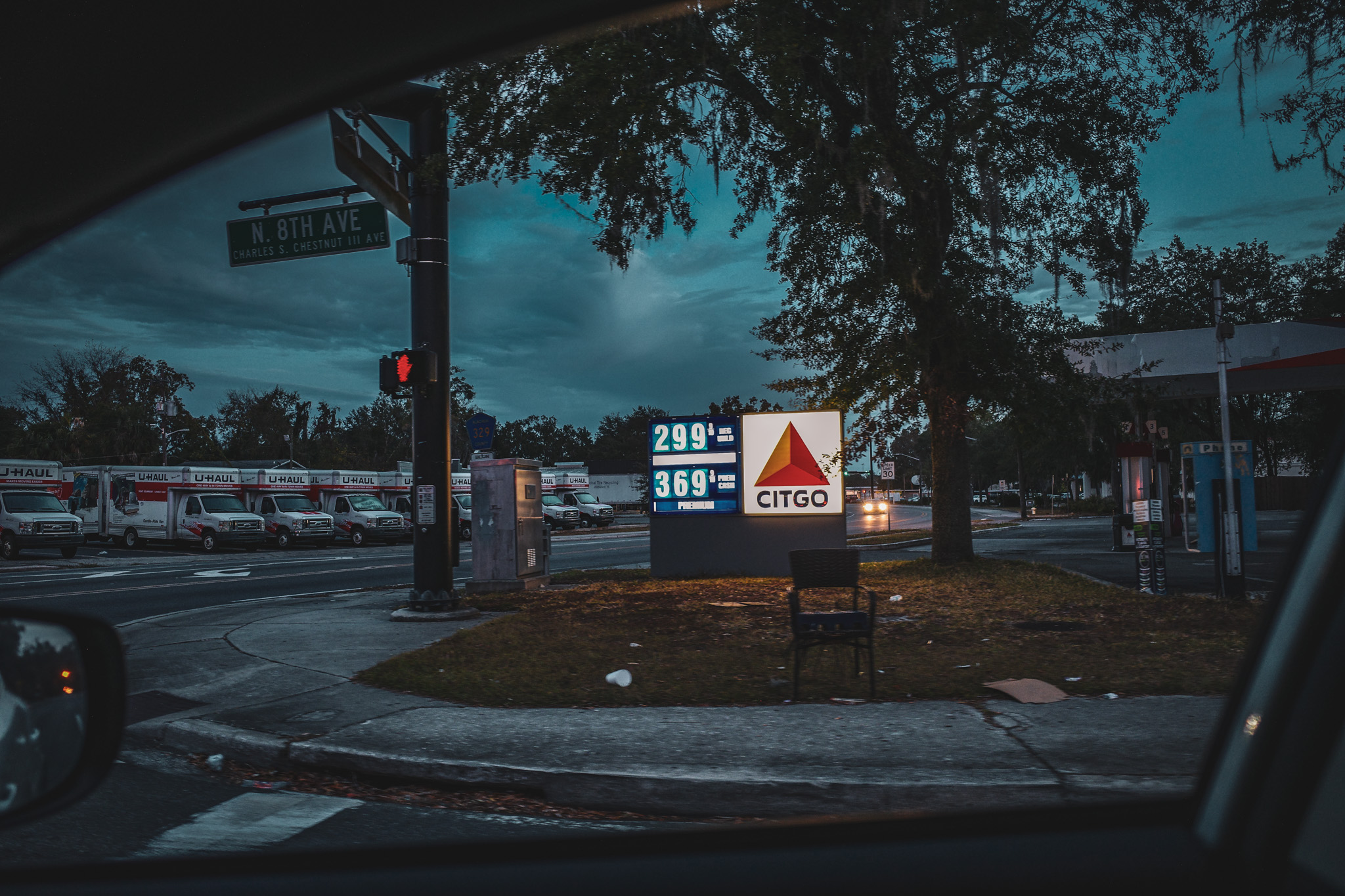 Intersection chair outside of a gas station