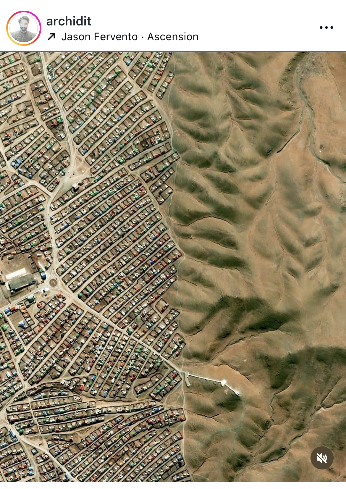 Aerial view: sharp divide between housing development and rolling natural hills
