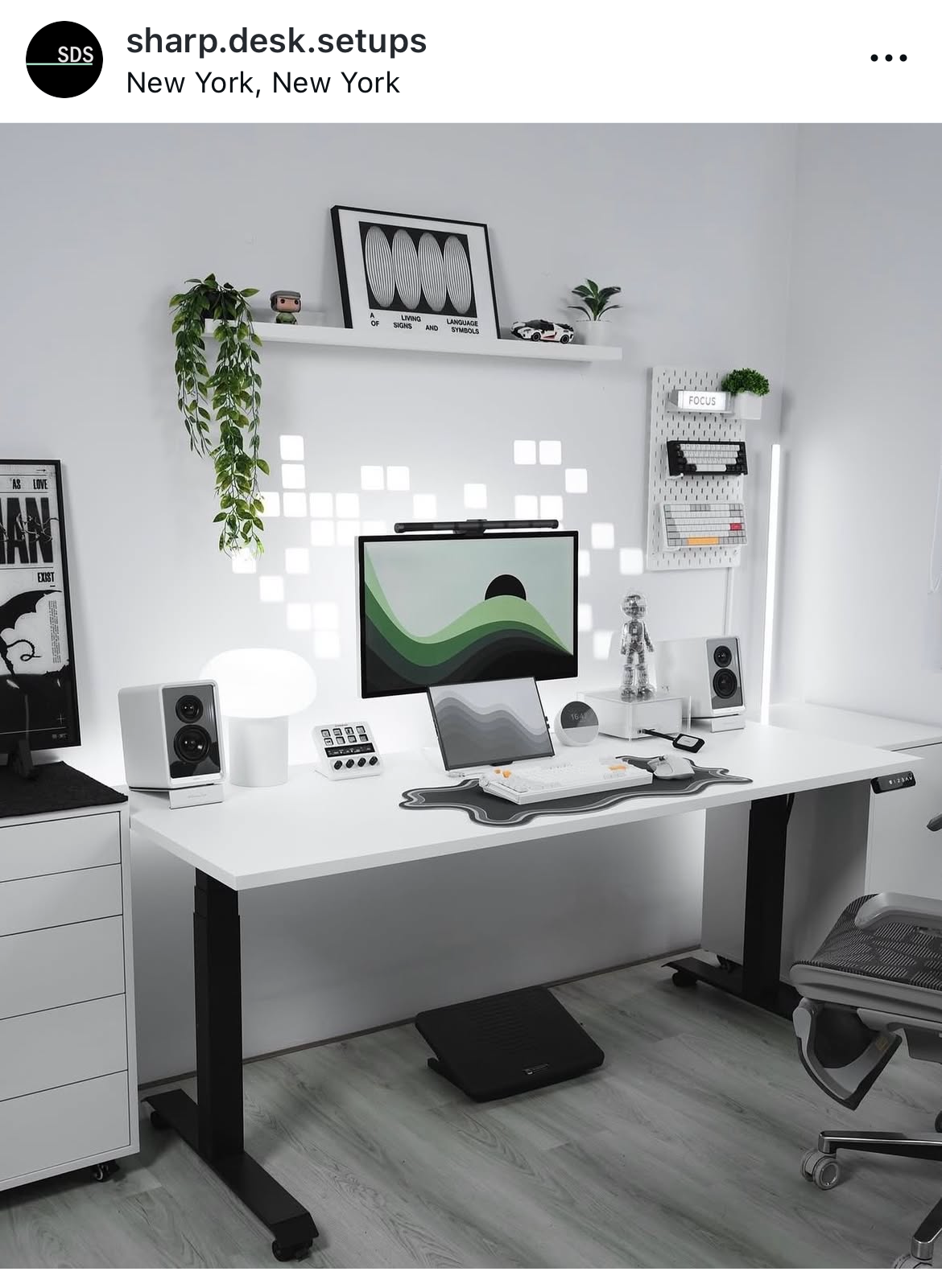 Clean, minimal workstation with a single monitor and calm lighting