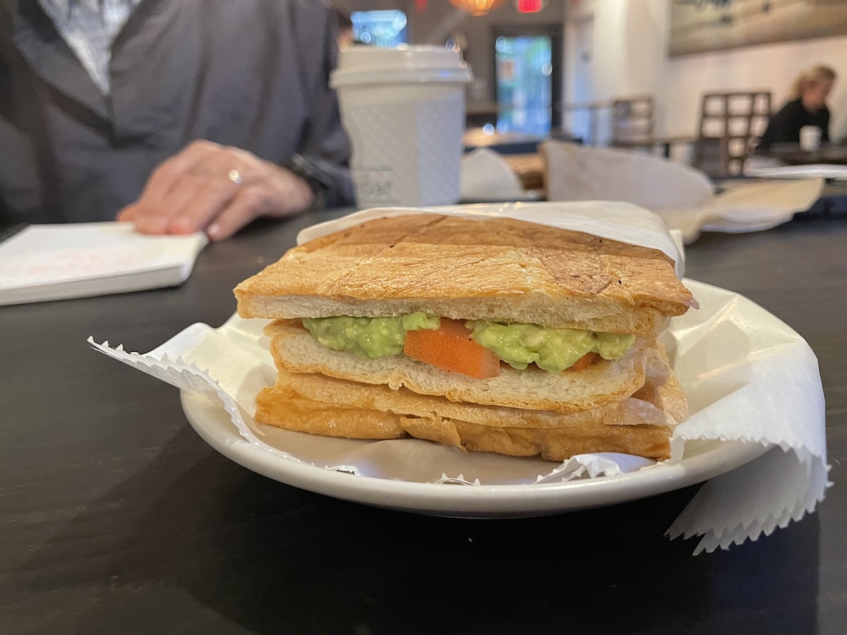 Avocado toast on Cuban bread at a neighborhood coffee bar